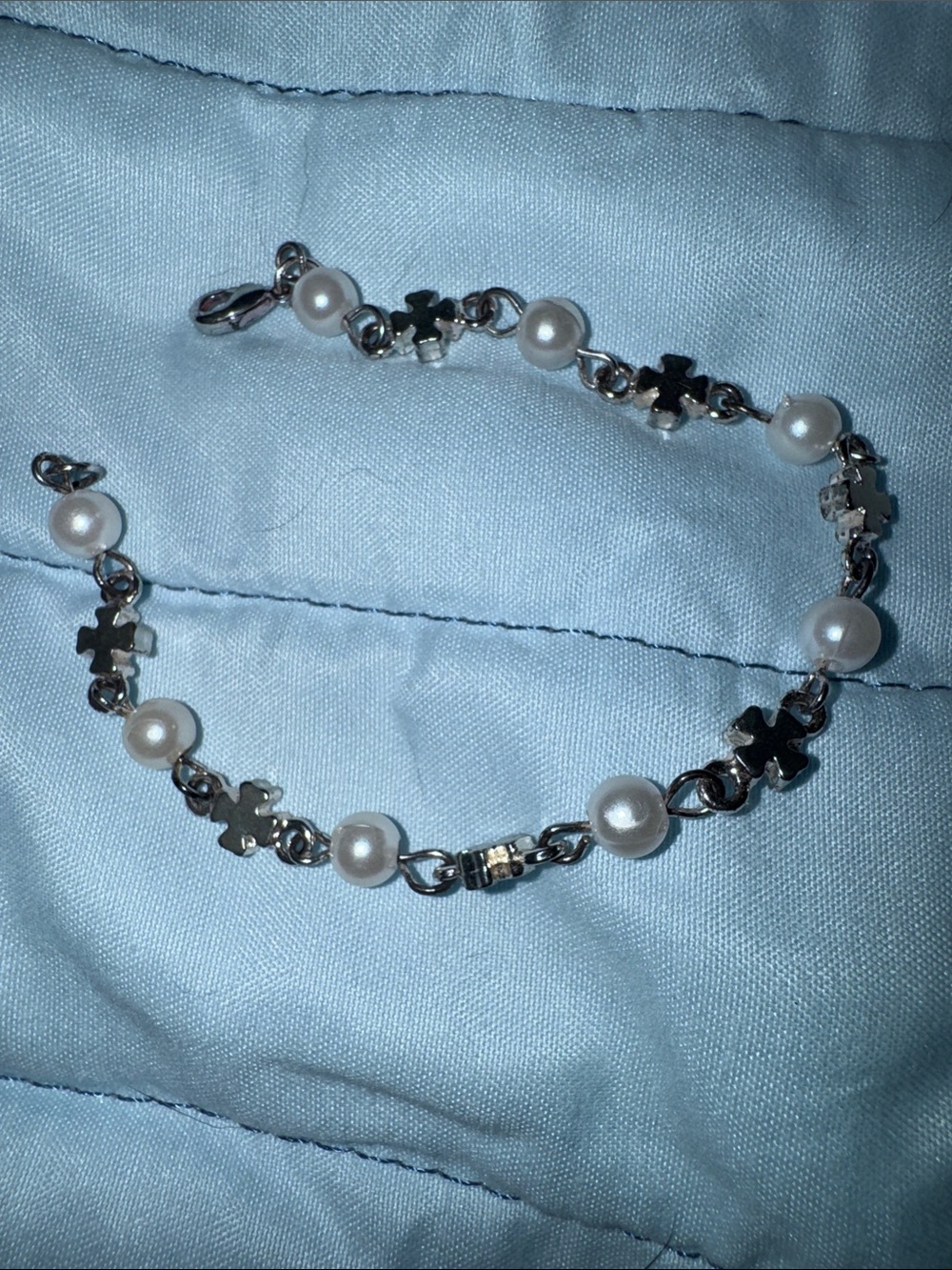 Pearl and Silver Cross Bracelet.